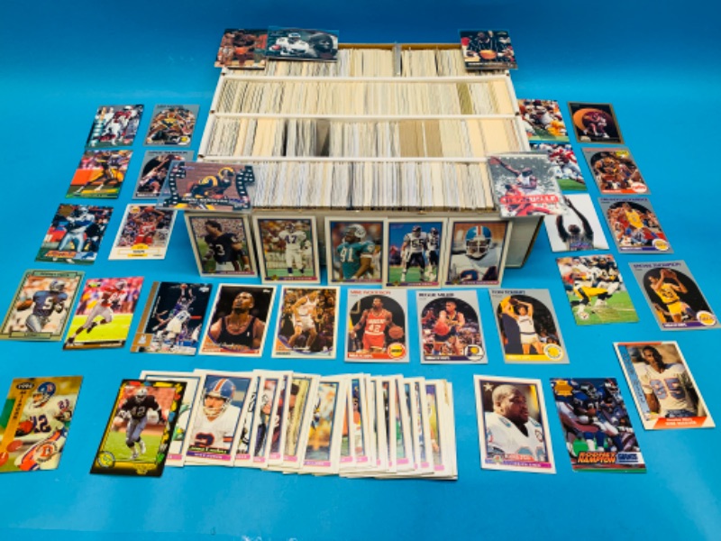 Photo 1 of 223989….2000+  Miscellaneous basketball and football trading cards in large box see photos 