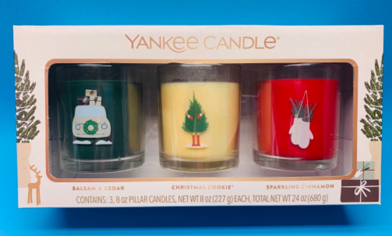 Photo 1 of 223993… 3 Yankee Candle holiday pillar candle jars