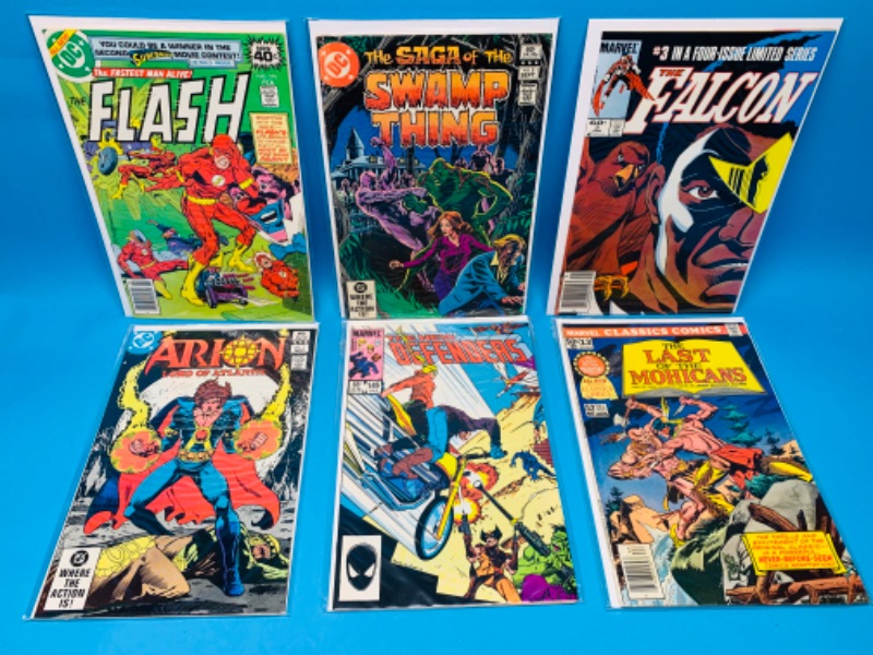 Photo 1 of 224024…vintage $.40-.65 cent  comics in plastic sleeves 