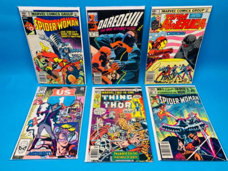 Photo 1 of 224025…vintage $.30-.75 cent  comics in plastic sleeves 