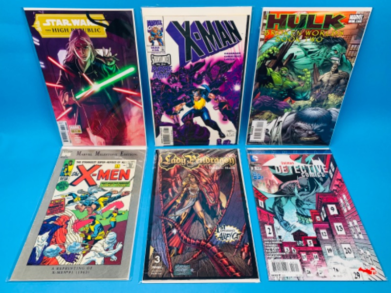 Photo 1 of 224126…6  comics in plastic sleeves 