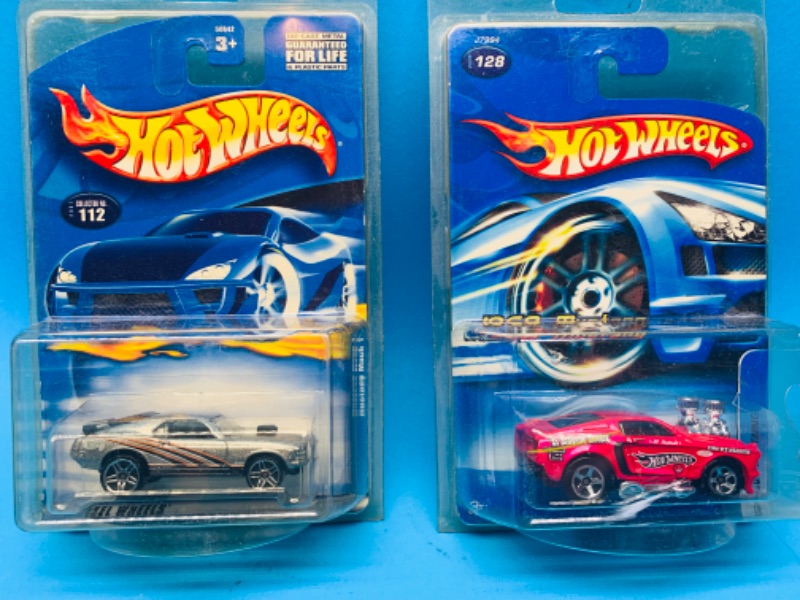 Photo 1 of 224138…2 hot wheels die cast Ford Mustang cars in plastic cases 