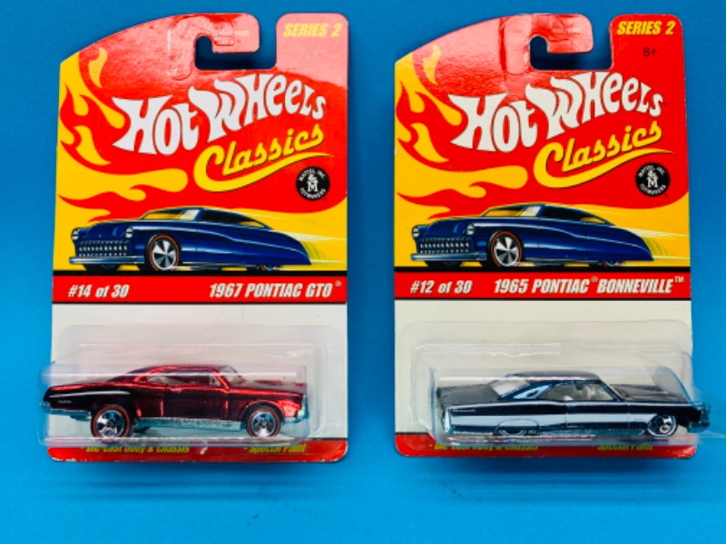 Photo 1 of 224457…2  hot wheels classics die cast Pontiac cars with special paint 