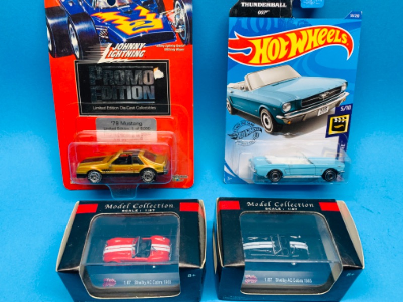 Photo 1 of 224467…4 collectible die cast cars 