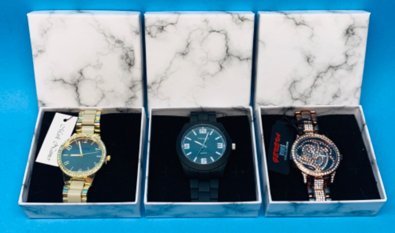 Photo 1 of 224847… 3 men’s watches- will need batteries replaced 