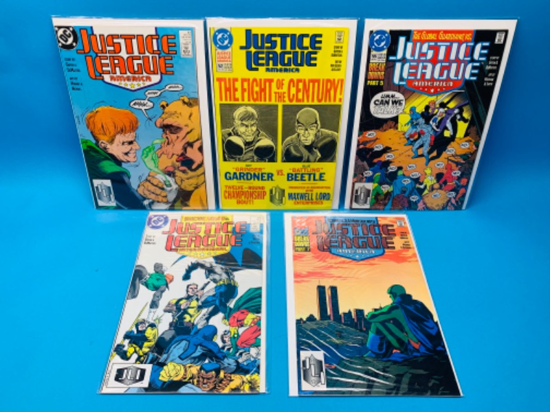 Photo 1 of 224897…5 justice league  comics in plastic sleeves 