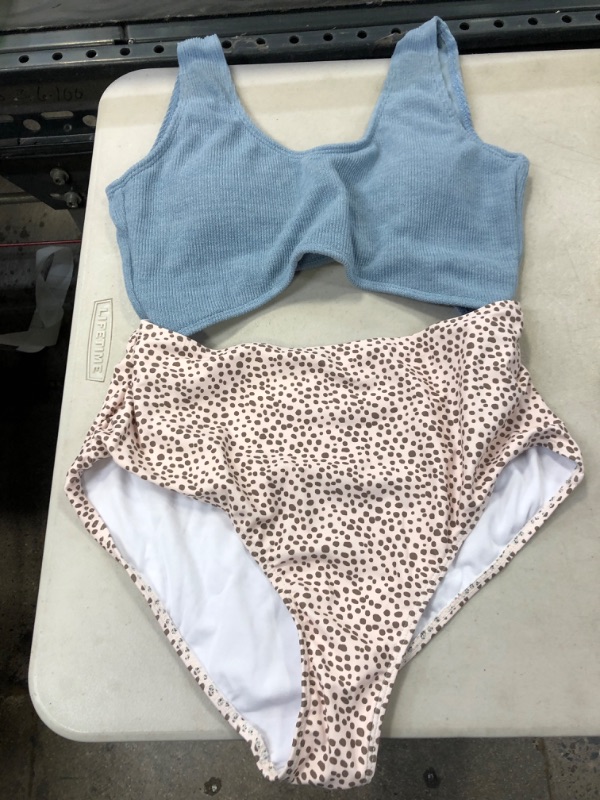 Photo 1 of  WOMENS ONE PIECE SWIMSUIT
SIZE LARGE 