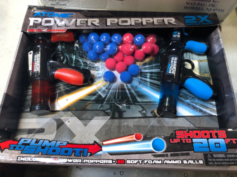 Photo 2 of Hog Wild Atomic Power Popper Red and Blue Battle Set - Two Rapid Fire Foam Ball Blaster Guns with 32 Foam Balls - Shoots Up to 8 Foam Balls Each 
OPEN BOX ITEM 