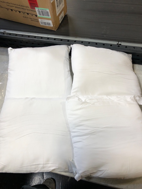 Photo 1 of 4 COUNT SMALL 12X12 PILLOWS
USED
NEEDS WASH