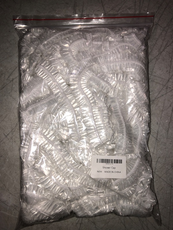 Photo 2 of 100PCS Shower Caps, Plastic Clear Bath Hair Cap and Disposable Waterproof Bath Caps with Elastic Band for Hair Treatment, Spa, and Hair Solon, Hotel and Home Use (Size 16.5IN)