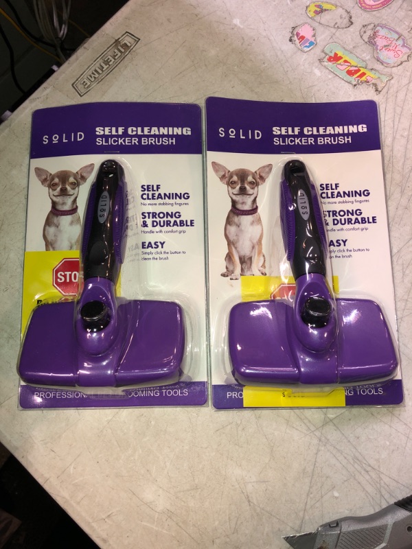 Photo 2 of Pet Slicker Brush - Dog & Cat Brush for Shedding & Grooming - Dematting & Detangling Self-Cleaning Brushes for Dogs, Cats & Pets Purple. 2 COUNT