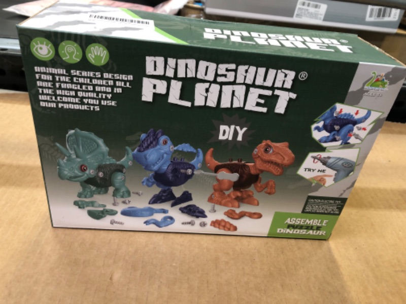 Photo 2 of GUAKAWOO Dinosaur Toys for 3 4 5 6 7 8 Year Old Boys, Christmas Take Apart Dino Toys, STEM Construction Building Kids Toy Set with Electric Drill for Birthday Gift---factory sealed