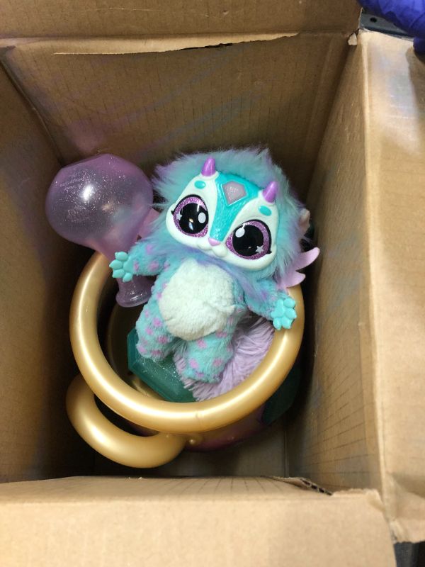 Photo 1 of Magic Mixies Magical Misting Cauldron with Interactive 8 inch Blue Plush Toy and 50+ Sounds and Reactions, Multicolor