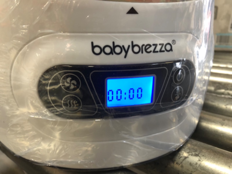 Photo 3 of Baby Brezza Baby Bottle Sterilizer and Dryer Machine – Electric Steam Sterilization - Universal Fit - Pacifiers, Glass, Plastic, and Newborn Feeding Bottles