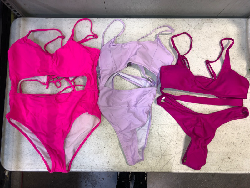 Photo 1 of 3 WOMENS SWIMSUITS BUNDLE: 1 neon pink one-piece no size; 1 lilac size SMALL; 1 pink bikini size MEDIUM