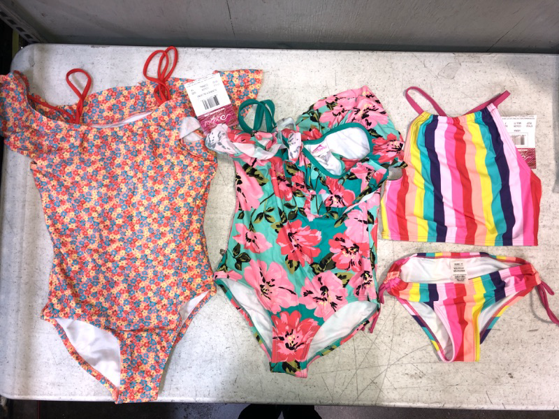 Photo 1 of 3 GIRLS SWIMSUITS BUNDLE: left side 1-piece SIZE 14; middle one-piece one-strap SIZE 10; right side 2-piece SIZE 7