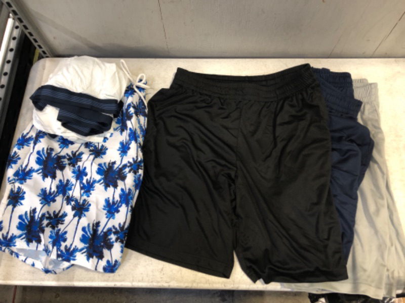 Photo 1 of 7-PIECE MENS CLOTHING BUNDLE: 3 GOODTHREADS WHITE BRIEFS XXXL; 1 BLUE SWIM SHORT L; 3 ATHLETIC SHORTS L