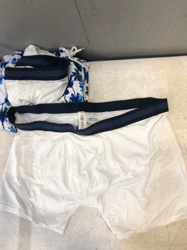 Photo 2 of 7-PIECE MENS CLOTHING BUNDLE: 3 GOODTHREADS WHITE BRIEFS XXXL; 1 BLUE SWIM SHORT L; 3 ATHLETIC SHORTS L