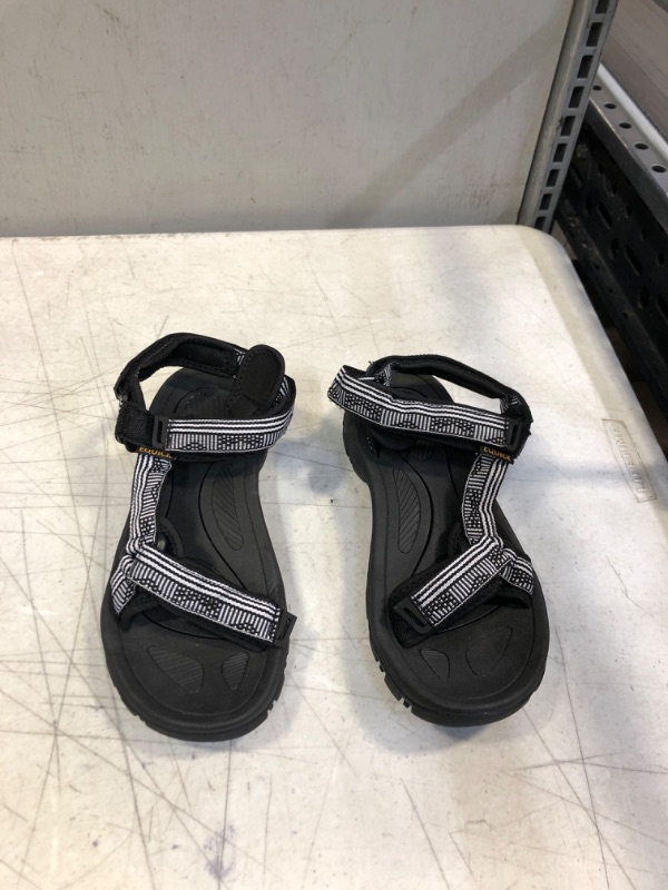 Photo 1 of 8.5 BLACK AND WHITE SANDALS 