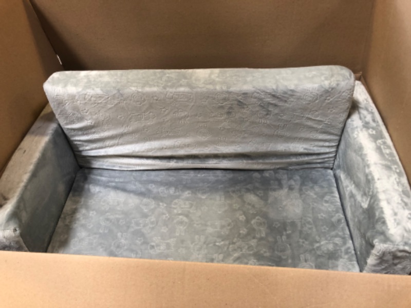 Photo 2 of KIDS GREY COUCH
USED