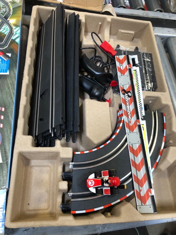 Photo 2 of Carrera Mario Kart 8 Racing Track Set
MINOR DAMAGE TO TRACK//SEE PHOTO//