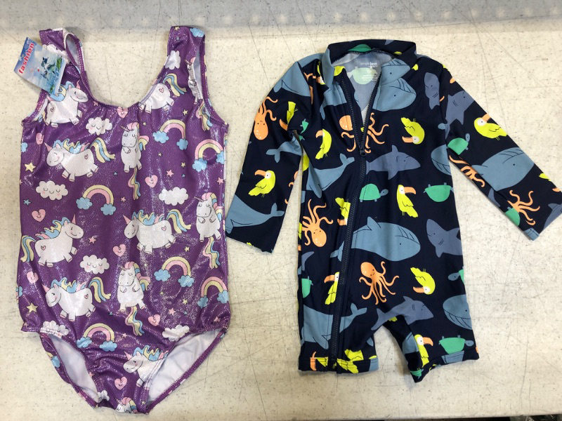 Photo 1 of 2-ITEM KIDS SWIM BUNDLE:1 Simple Joys by Carter's Toddlers and Baby Boys' 1-Piece Zip Rashguards (SIZE 12 MO) & Girls sparkle one-piece swimsuit purple size 140