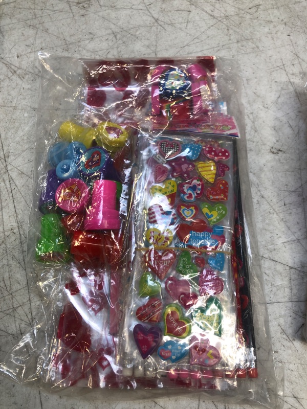 Photo 2 of 102PCS Valentine Stationary Set with Cellophane Treat Bags Valentines Day Gifts for Kids Classroom Exchange Prizes Party Favors with Erasers Stampers Stickers Cards Pencils