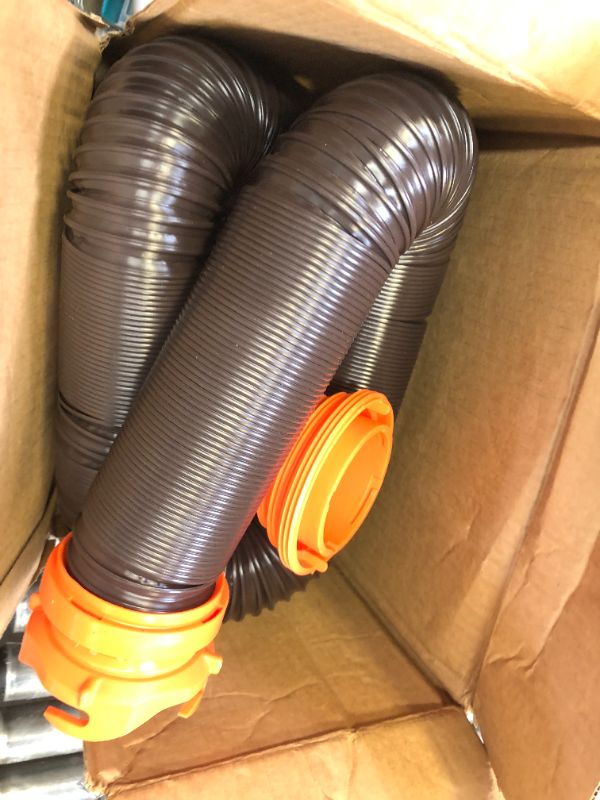 Photo 2 of Camco RhinoFLEX RV Sewer Hose Kit with Swivel Transparent Elbow and 4-in-1 Dump Station Fitting, Brown, 15 Feet (39770) 15ft Sewer Hose Kit Frustration-Free Packaging