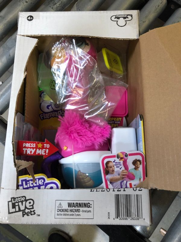 Photo 2 of Little Live Pets Gotta Go Flamingo Value Pack: Sherbet | Interactive Plush Toy That Eats, Sings, Dances, Poops and Talks. Bonus Food, Containers and Bib. Batteries Included. for Kids Ages 4+.