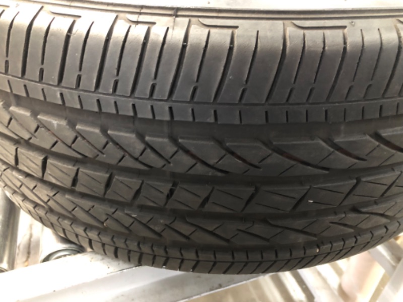 Photo 4 of **MINOR DAMAGE SEEMS USED STILL FUNCTIONAL**
Bridgestone Alenza 001 Performance SUV Tire 245/50R19 105 W Extra Load