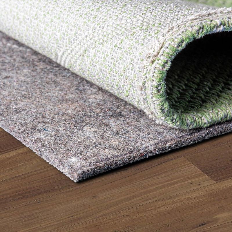 Photo 1 of  Uni-Luxe Dual Surface Felt and Rubber Non-Slip Rug Pad 1/4" Thick (5'x 8')