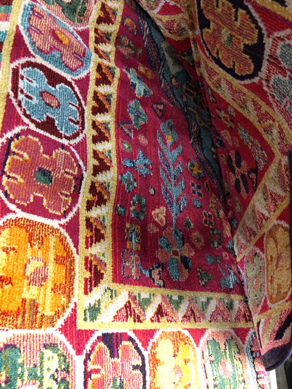 Photo 2 of Multi color rug 10’ x 14’