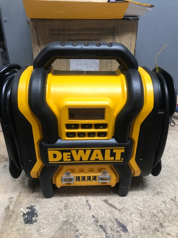 Photo 2 of DEWALT DXAEPS14 1600 Peak Battery Amp 12V Automotive Jump Starter/Power Station with 500 Watt AC Power Inverter, 120 PSI Digital Compressor, and USB Power , Yellow