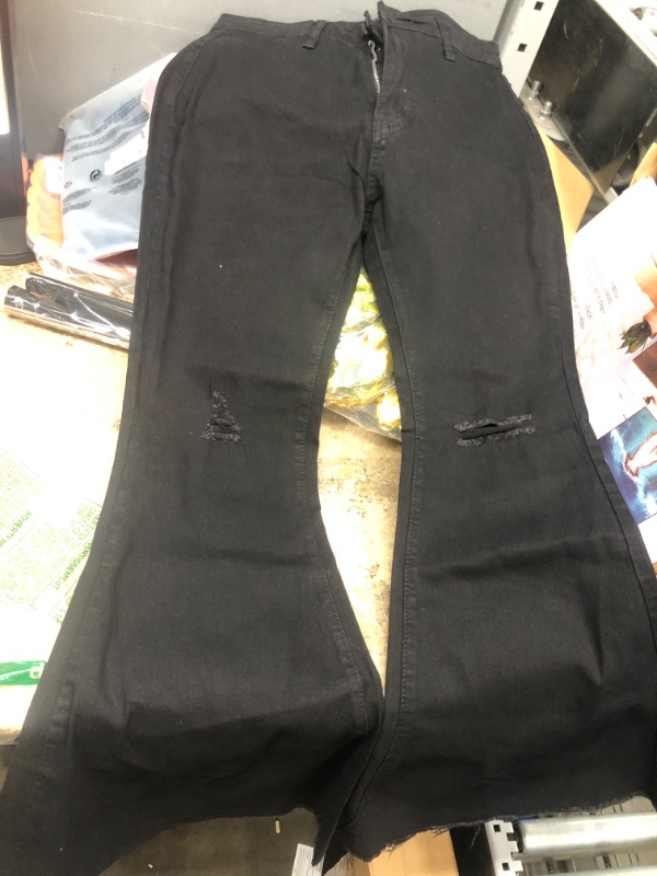 Photo 1 of BLACK BELL BOTTOM DISTRESSED JEANS SIZE MEDIUM  