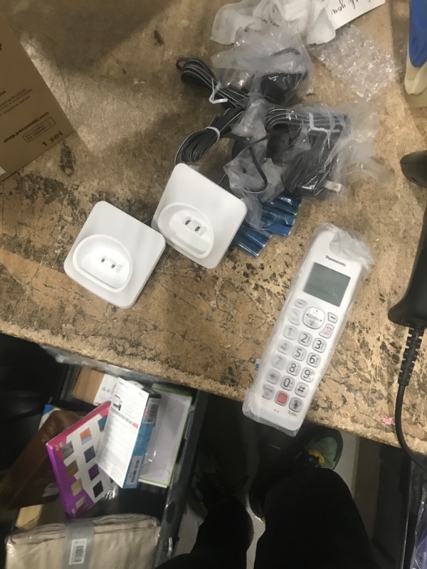 Photo 2 of Panasonic Cordless Phone with Answering Machine, Link2Cell Bluetooth, Voice Assistant and Advanced Call Blocking, Expandable System with 4 Handsets - KX-TGD864W (White)