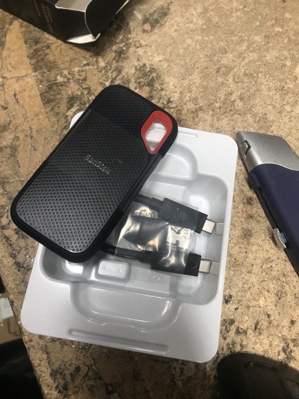 Photo 2 of SanDisk 2TB Extreme Portable SSD - Up to 1050MB/s - USB-C, USB 3.2 Gen 2 - External Solid State Drive - SDSSDE61-2T00-G25 1TB SSD