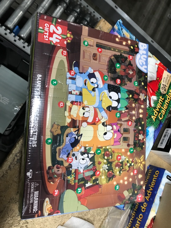 Photo 2 of Bluey's Exclusive Advent Calendar Pack. Open the Packaging To Find A Bluey Surprise Each Day For 24 days Including Exclusive Figures! | Amazon Exclusive