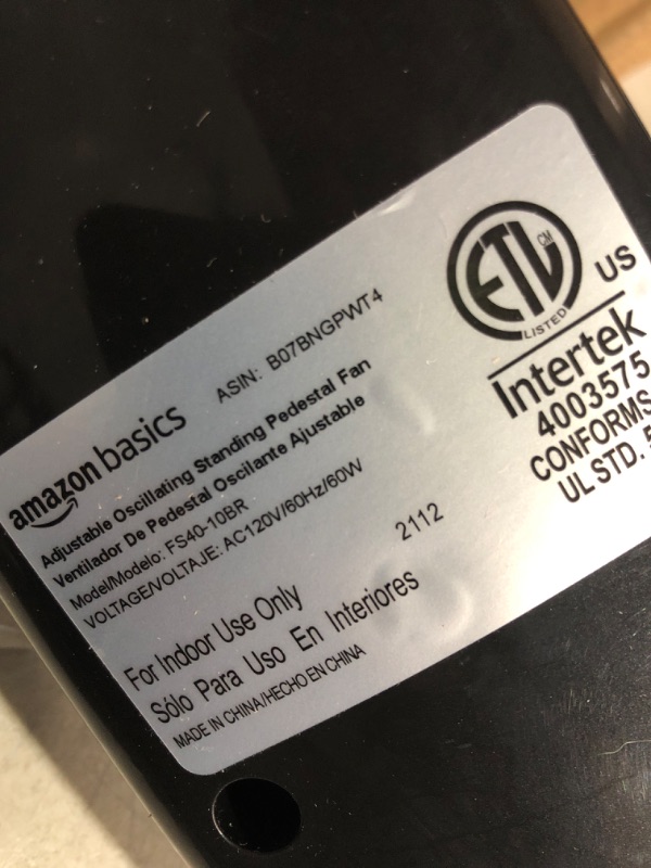 Photo 4 of * damaged * see all images * 
Amazon Basics Oscillating Dual Blade Standing Pedestal Fan with Remote - 16-Inch, Black