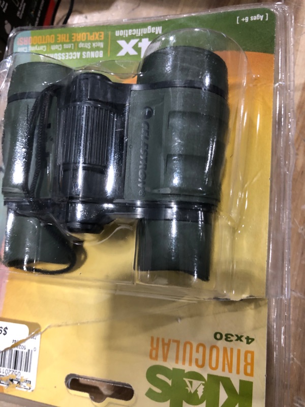 Photo 2 of Celestron Kids Let Your Child Explore The Outdoors Binocular, Green (72044) & Kids Let Your Child Explore The World Microscope, Green (44116) Binocular