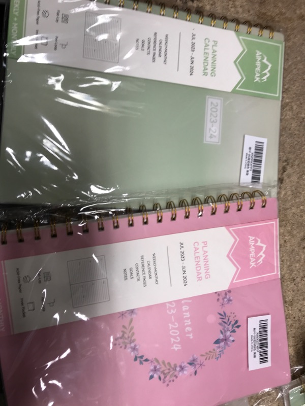 Photo 2 of Planner 2023-2024, Academic Year Planner from Jul.2023-Jun.2024, AIMPEAK 2023-2024 Planner Weekly and Monthly with Tabs, Pocket, Pen Loop, PVC Waterproof Cover, Spiral Binding, Pink(7"x10") Garland Pink New-B5 2 pk 