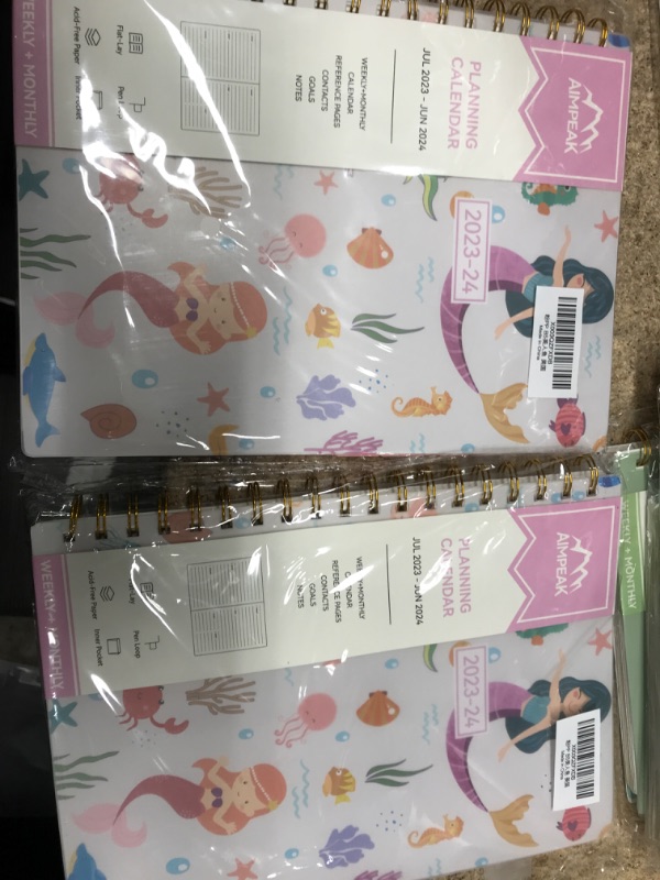 Photo 2 of Planner 2023-2024, Academic Year Planner from Jul.2023 - Jun.2024, AIMPEAK 2023-2024 Planner Weekly and Monthly with Tabs, Inner Pocket, Pen Loop, Waterproof Cover, Spiral Binding, Mermaid(7"x10") Mermaid New-B5 2 pk 