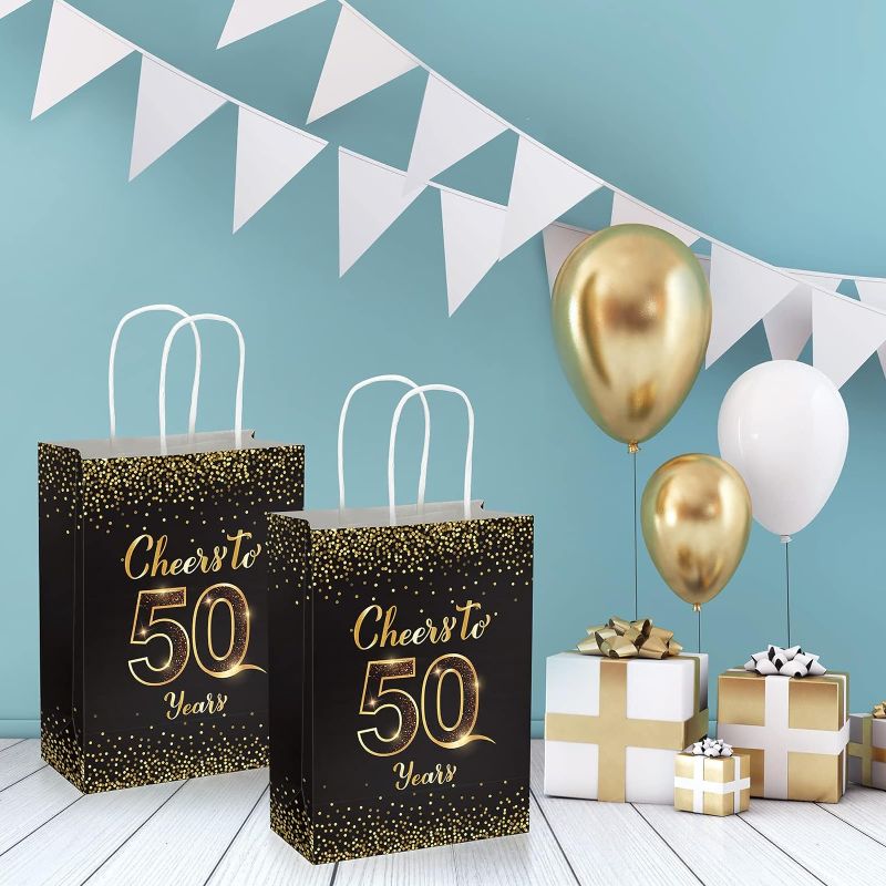 Photo 1 of 12 Pack 50th Birthday Gift Bags Cheers to 50 Years Ideas Party Favors Bags Black and Gold Treat Bags Paper Candy Goodie Bags with Handles for Birthday Anniversary Wedding Decorations Supplies