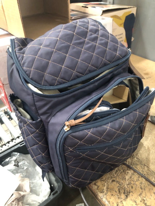 Photo 2 of * zipper damaged * see images * 
Skip Hop Diaper Bag Backpack: Forma, Multi-Function Baby Travel Bag with Changing Pad & Stroller Attachment, Navy Forma Navy