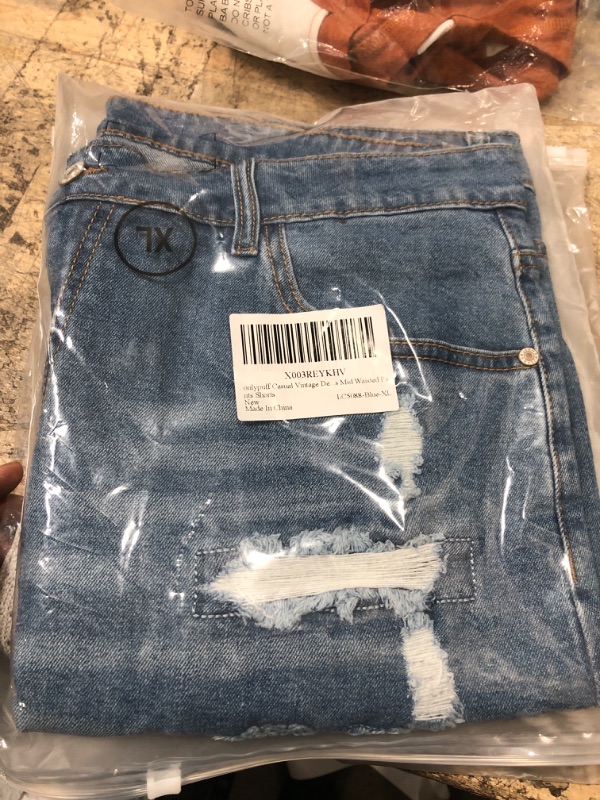 Photo 2 of onlypuff Women's Ripped Mid Waisted Denim Shorts with Pockets xl