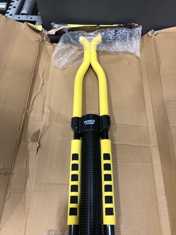 Photo 1 of BUBBLE JUMP Pogo Stick for Kids Age 10 & up Yellow - for Boys, Girls, Teens & Adults 80 to 160 Lbs - Easy Grip Rubber Handle Master Jumper Pogo Sticks - High Jumping Kids Pogo Stick