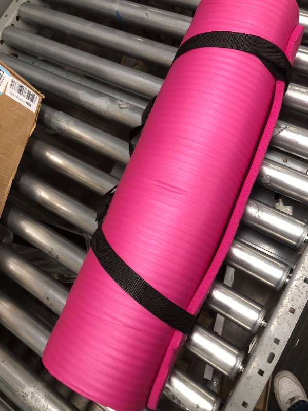 Photo 1 of PINK YOGA MAT WITH BLACK STRAPS 