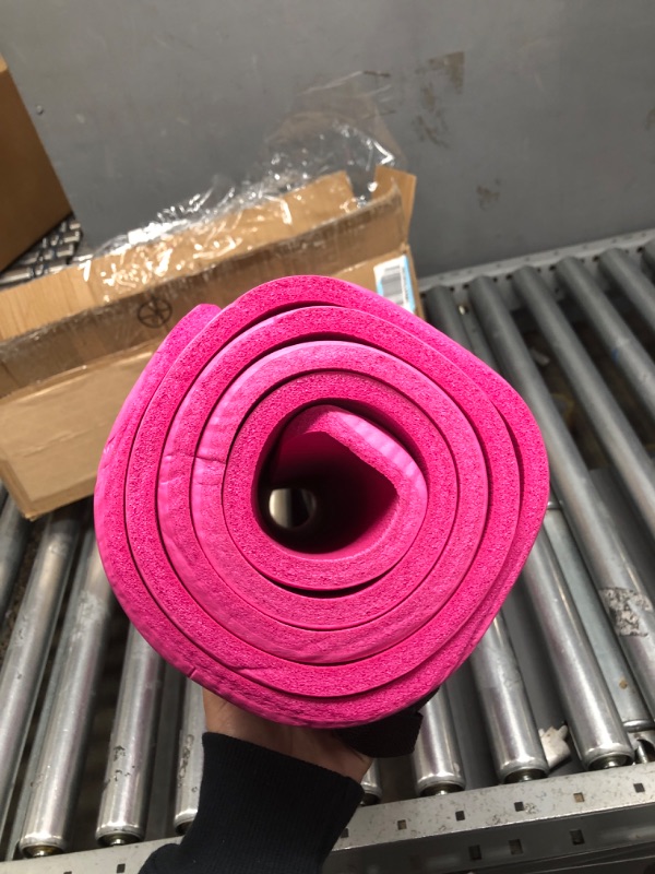 Photo 2 of PINK YOGA MAT WITH BLACK STRAPS 