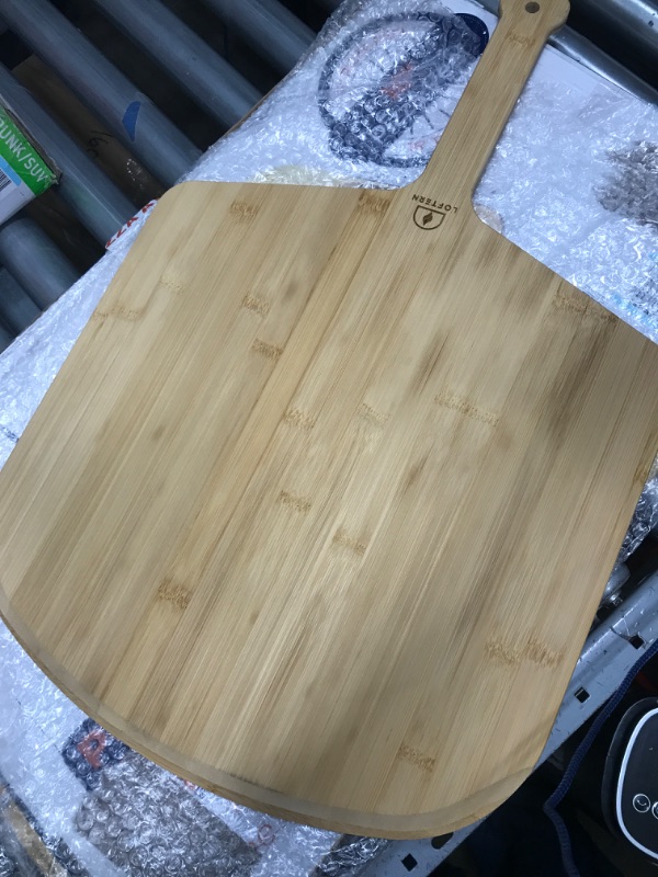 Photo 2 of Loftern Wooden Pizza Peel 16 Inch Board with Engraved Sizes - Multi-Purpose Bamboo Pizza Cutting Board, Wood Pizza Peel, Pizza Spatula Paddle, and Serving Board with Size and Cutting Guide