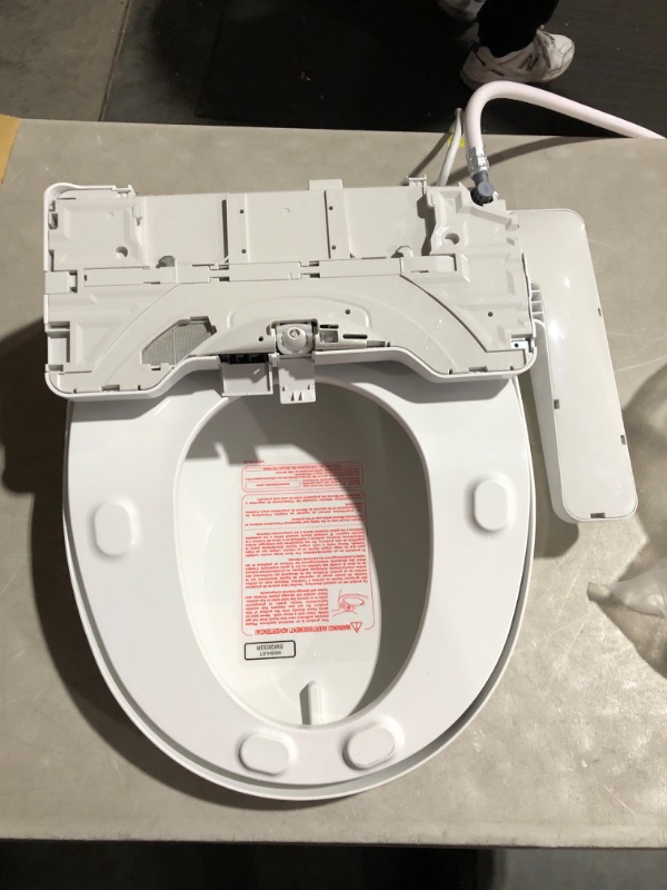 Photo 1 of ***USED - DIRTY - WET - POWERS ON - UNABLE TO TEST FURTHER***
TOTO SW2033R#01 C100 Electronic Bidet Toilet Cleansing Water