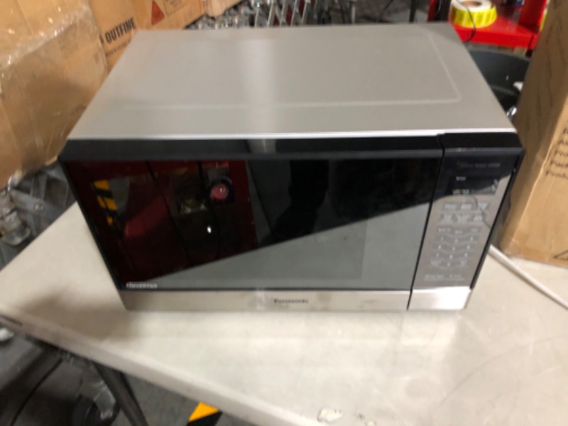 Photo 1 of **PARTS ONLY** **DAMAGE** **POWERS ON** **SEE NOTES** Panasonic Microwave Oven 